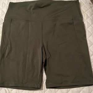 Like new olive green 7” inseam Senita shorts